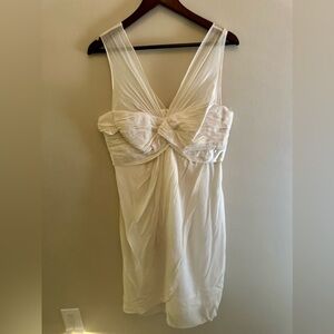 Donna Ricco Twist Bodice Silk Chiffon Size 12 Ivory med knee length.